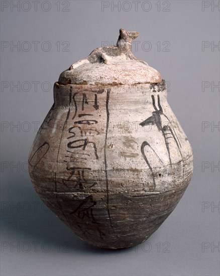 Shawabty Jar with Lid, 1295-1069 BC. Egypt, New Kingdom, Dynasty 19 (1295-1186 BC) - Dynasty 20 (1186-1069 BC). Nile silt ware; diameter: 22.2 cm (8 3/4 in.); diameter of mouth: 11.6 cm (4 9/16 in.); overall: 29.4 cm (11 9/16 in.).