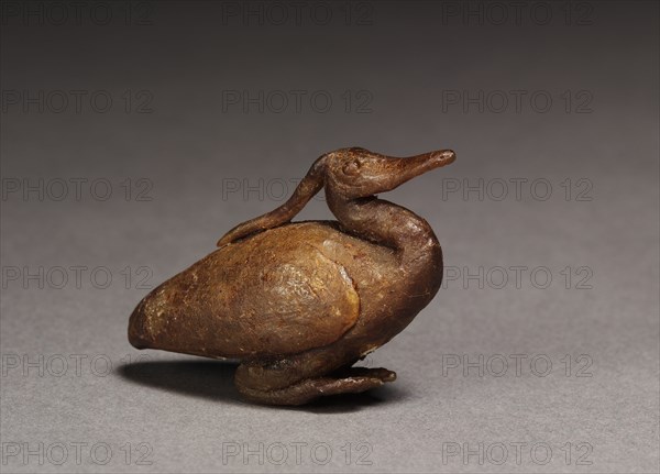 Benu-bird, 1000-500 BC. Egypt, Third Intermediate Period, late Dynasty 21 (1069-945 BC) or early Dynasty 22 (945-715 BC). Honey-colored wax with dark amber varnish; overall: 3.2 cm (1 1/4 in.).