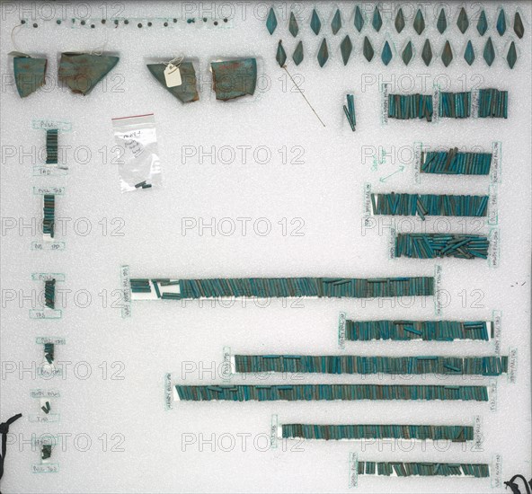 Jewelry of Senbi, 1980-1801 BC. Egypt, Middle Kingdom. Blue-to-turquoise faience; diameter: 3 cm (1 3/16 in.); tubular beads: 2 cm (13/16 in.); beads: 3.4 cm (1 5/16 in.); terminals: 11 cm (4 5/16 in.).