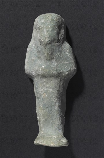 Shawabty of Ditamenpaankh, 715-656 BC. Egypt, Late Period, Dynasty 25. Terracotta; overall: 6.7 x 2.6 x 1.7 cm (2 5/8 x 1 x 11/16 in.).
