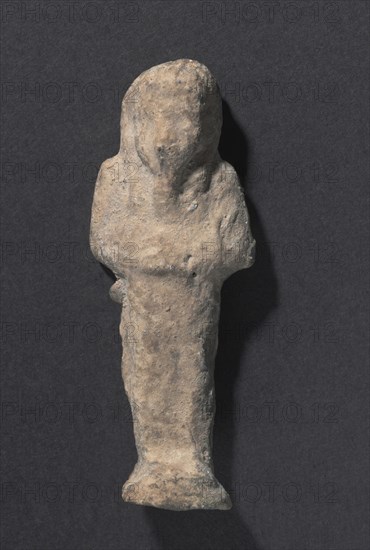 Shawabty of Ditamenpaankh, 715-656 BC. Egypt, Late Period, Dynasty 25. Terracotta; overall: 6.7 x 2.7 x 1.6 cm (2 5/8 x 1 1/16 x 5/8 in.).