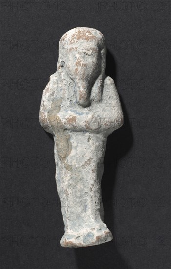 Shawabty of Ditamenpaankh, 715-656 BC. Egypt, Late Period, Dynasty 25. Terracotta; overall: 6.7 x 2.6 x 1.8 cm (2 5/8 x 1 x 11/16 in.).