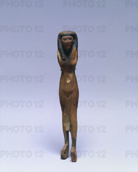 Female Offering Bearer, 1980-1801 BC. Egypt, Middle Kingdom, Dynasty 12, 1980-1801 BC. Painted cedar; overall: 26 x 4.4 x 5.1 cm (10 1/4 x 1 3/4 x 2 in.).