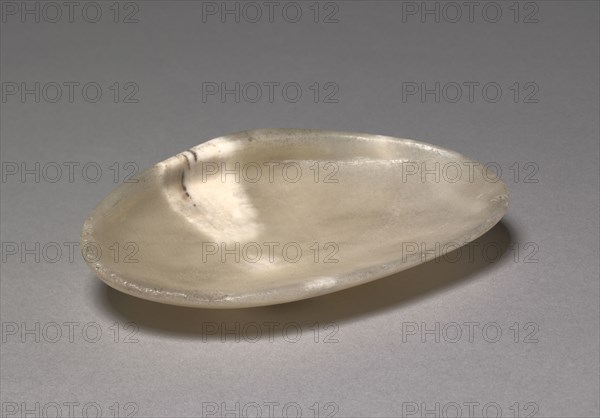 Dish in the Form of a Shell, 1540-1296 BC. Egypt, New Kingdom, Dynasty 18, 1540-1296 BC. Travertine; overall: 2.4 x 9.1 cm (15/16 x 3 9/16 in.).