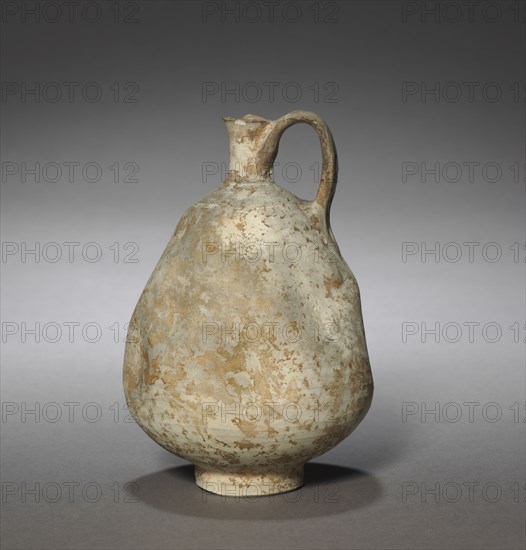 Jug, 1100s-1200s. Iran or Iraq, late Seljuq Period, 11th-13th Century. Earthenware; overall: 15.5 x 11 cm (6 1/8 x 4 5/16 in.).