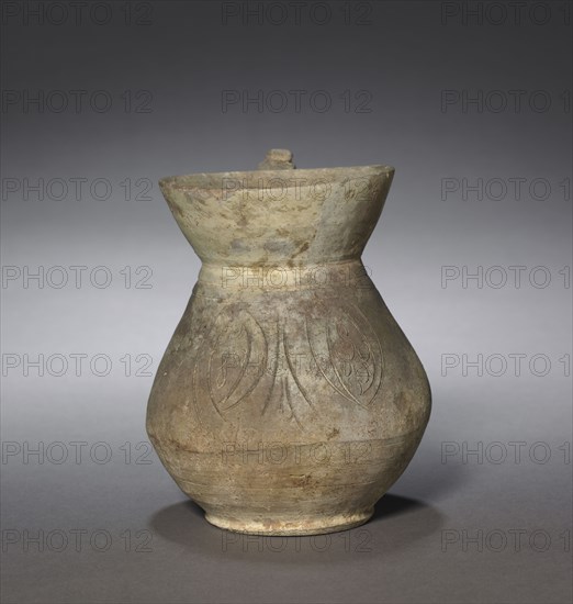 Jug, 900s-1100s. Iran, Samanid Period, 10th-12th Century. Earthenware; overall: 14 x 12 cm (5 1/2 x 4 3/4 in.).