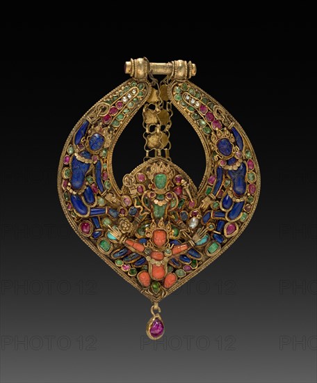 Deity Earring with Vishnu on Garuda (front) and chepu (monster mask) (back), 1600s or 1700s. Nepal, Kathmandu Valley. Gold set with precious and semi-precious stones; 9.5 x 6.9 cm (3 3/4 x 2 11/16 in.).