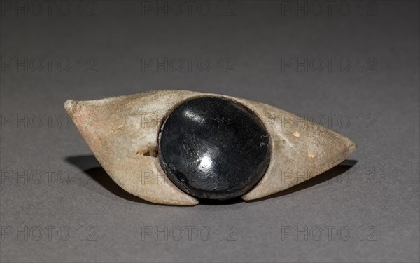 Inlay Eye from Coffin, 1980-1801 BC. Egypt, Middle Kingdom, Dynasty 12. Travertine and obsidian; overall: 2.7 cm (1 1/16 in.).