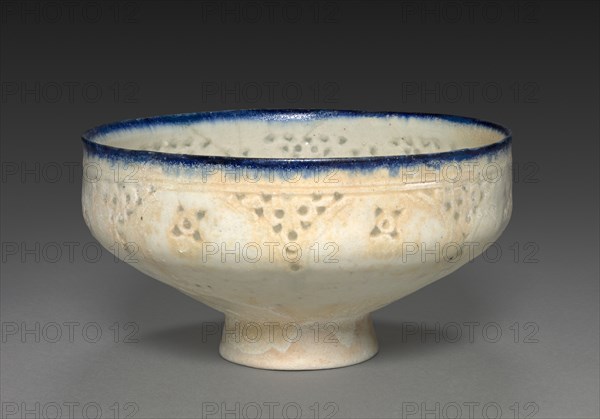 Footed Bowl, late 1100s-early 1200s. Iran, probably Kashan, Seljuq period, late 12-early 13th century. Fritware, pierced and underglaze painting; overall: 9.8 x 18.2 cm (3 7/8 x 7 3/16 in.).