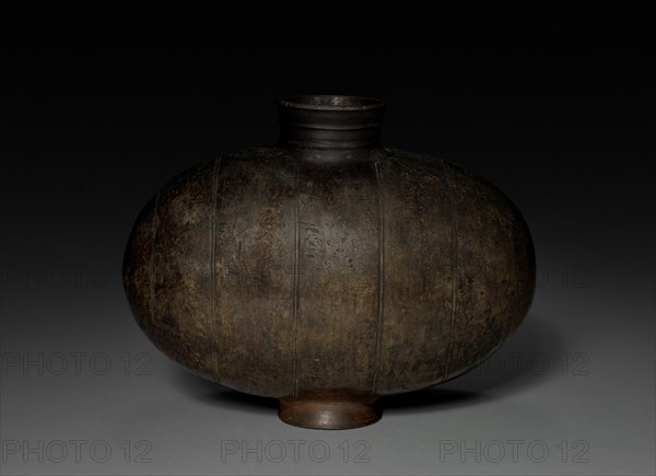 Cocoon Flask, 206 BC - AD 9. China, Western Han dynasty (202 BC-AD 9). Earthenware; diameter of mouth: 9.3 cm (3 11/16 in.); overall: 26.4 x 34.8 cm (10 3/8 x 13 11/16 in.).