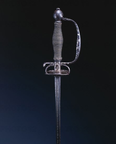 Small Sword for a Boy, c. 1650-1680. Italy, 17th century. Steel, wood; hilt with inlaid floral designs in silver; overall: 78.1 cm (30 3/4 in.); blade: 63.2 cm (24 7/8 in.); guard: 5.2 cm (2 1/16 in.)