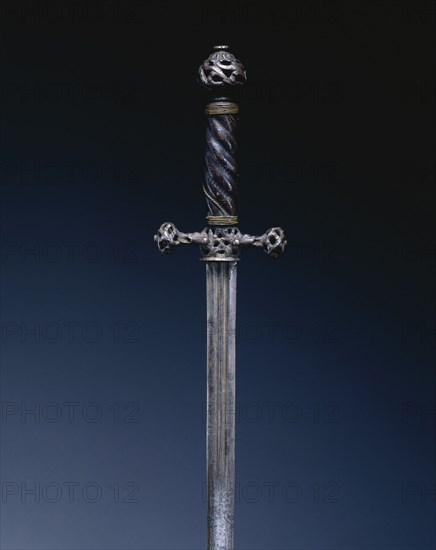 Pillow Sword, c. 1650. Italy, 17th century. Steel, pierced; leather and wood; overall: 93 cm (36 5/8 in.); blade: 77.8 cm (30 5/8 in.); quillions: 9.5 cm (3 3/4 in.).