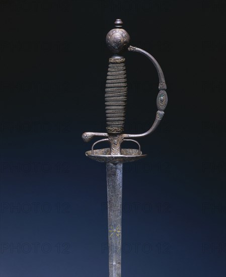 Small Sword, c. 1750-1770. France, Paris, 18th century. Steel, gilded with wood; overall: 103.2 cm (40 5/8 in.); blade: 86 cm (33 7/8 in.); guard: 7 cm (2 3/4 in.)