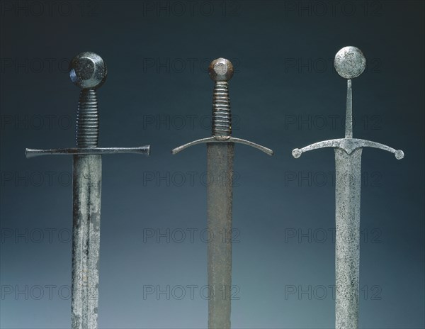 Sword, 1400s. Germany (?), 15th century. Steel; wood and leather grip; overall: 104.2 cm (41 in.); blade: 87.3 cm (34 3/8 in.); quillions: 20.3 cm (8 in.).