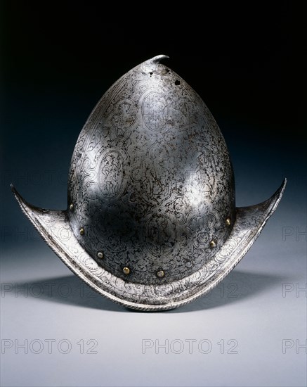 Pear Stalk Cabasset, 1580-1600. North Italy, Brescia(?), late 16th Century. Steel, etched, roped edge and brass rivets; overall: 30.5 x 36.8 x 18.4 cm (12 x 14 1/2 x 7 1/4 in.).
