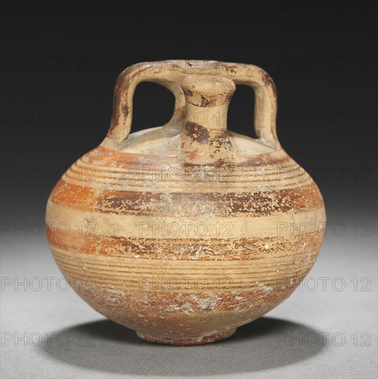 Miniature Stirrup Jar, c. 1350-1300 BC. Cyprus, Late Helladic III A2. Cypro-Mycenaean ware; diameter: 9.8 cm (3 7/8 in.); overall: 9.6 cm (3 3/4 in.); diameter of base: 3.4 cm (1 5/16 in.).