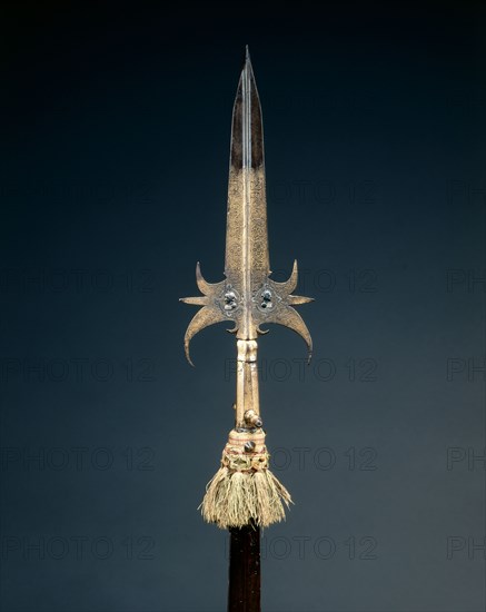 Partisan, 1600s. France, 17th century. Steel, gilt, etched and chiselled; overall: 209.5 cm (82 1/2 in.); blade: 32.4 cm (12 3/4 in.).