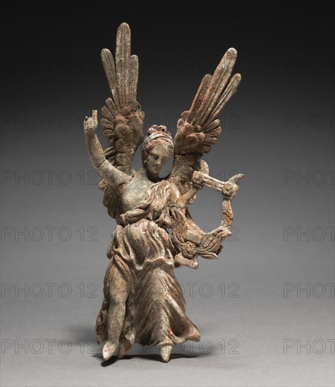 Figurine, 3rd-1st Century BC. Greece, Myrina, Hellenistic period. Terracotta; overall: 16.9 cm (6 5/8 in.).