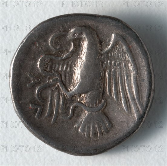Drachma: Flying Eagle (reverse), c. 369-336 BC. Greece, 4th century BC. Silver; diameter: 1.8 cm (11/16 in.).
