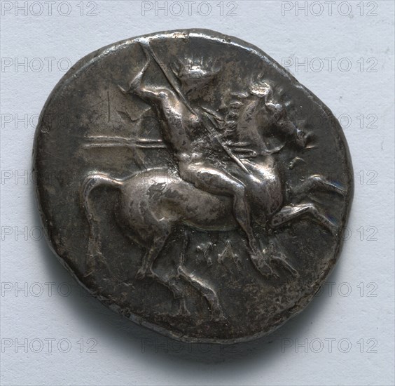 Stater: Naked Horseman with Spears and Shield (obverse), 334-302 BC. Greece, Tarentum, 4th century BC. Silver; diameter: 2.3 cm (7/8 in.).