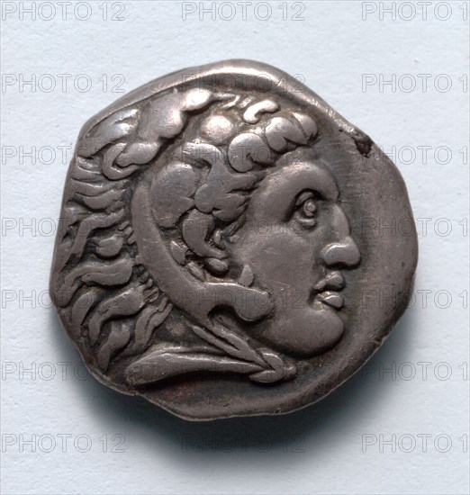 Rhodian Drachma: Club, Bow, and Owl (reverse), 387-300 BC. Greece, 4th century BC. Silver; diameter: 1.5 cm (9/16 in.).