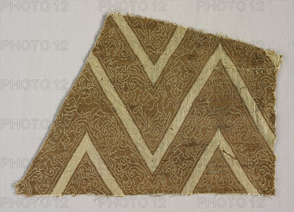 Fragment, late 1200s - 1300s. Iran or Iraq, late 13th - 14th century. Lampas weave, silk; overall: 25.7 x 18.5 cm (10 1/8 x 7 5/16 in.)
