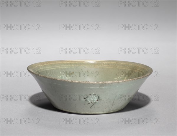 Saucer with Inlaid Chrysanthemum Design, 1200s. Korea, Goryeo period (918-1392). Pottery; diameter of mouth: 13.5 cm (5 5/16 in.); overall: 3.8 cm (1 1/2 in.).
