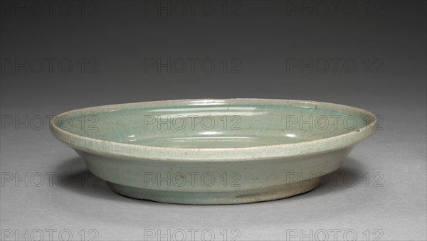 Saucer, 1100s. Korea, Goryeo period (936-1392). Pottery; diameter: 19.3 cm (7 5/8 in.); overall: 3.7 cm (1 7/16 in.).