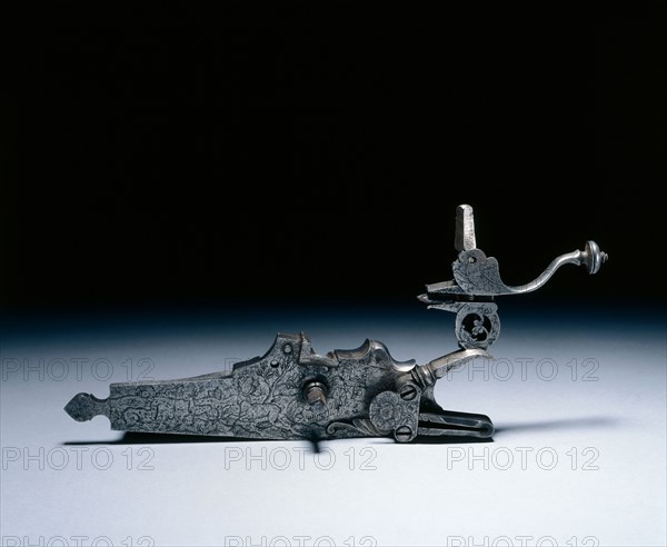 Wheel-Lock from a Hunting Rifle, early 1700s. Germany, early 18th Century. Steel, engraved; overall: 20.8 x 13.4 x 4.8 cm (8 3/16 x 5 1/4 x 1 7/8 in.).