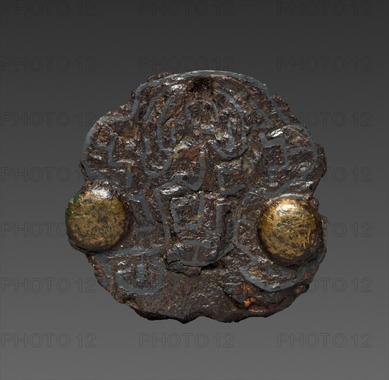 Brooch, 600s. Merovingian, Burgundian, Migration period, 7th century. Bronze and silver overlay; diameter: 3.2 cm (1 1/4 in.).