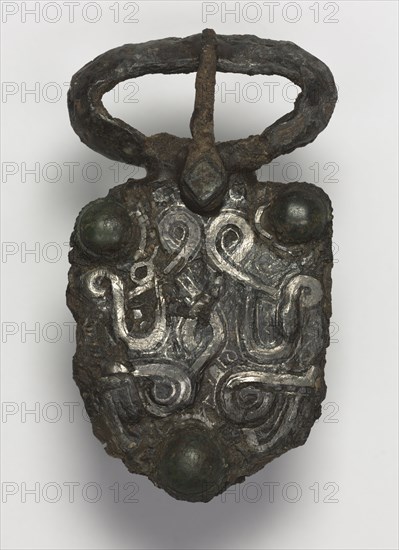 Belt Buckle, 600s. Frankish, Migration period, 7th century. Iron with silver overlay; overall: 10.2 x 5.9 cm (4 x 2 5/16 in.)