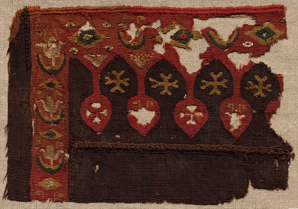 Fragment of a Tunic, 400s - 600s. Egypt, Byzantine period, 5th - 7th century. Tabby weave with interwoven tapestry ornament, linen and wool; overall: 21.3 x 15 cm (8 3/8 x 5 7/8 in.)