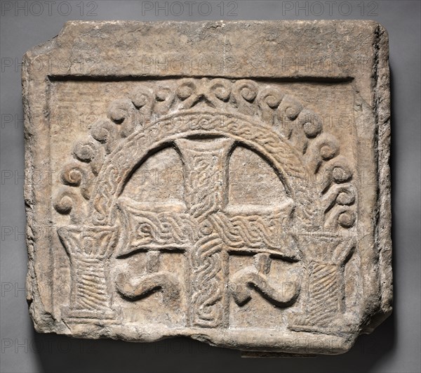 Relief Panel from the End of a Sarcophagus:  A Cross Within an Arch, 700s-800s. Lombardic, Italy, Rome, Migration period, 8th-9th Century. Marble; overall: 51.8 x 57.8 cm (20 3/8 x 22 3/4 in.)