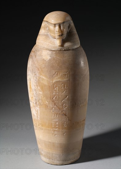 Canopic Jar with Man's Head, 664-525 BC. Egypt, Late Period, Dynasty 26. Travertine; diameter: 16.6 cm (6 9/16 in.); diameter of mouth: 9 cm (3 9/16 in.); overall: 38.8 cm (15 1/4 in.).