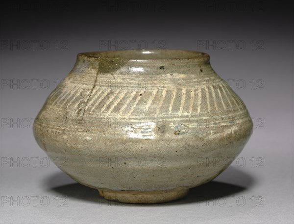 Bowl with Stamped Decoration, 1400s. Korea, early Joseon dynasty (1392-1910). Stoneware with incised design, white slip, and overglaze; outer diameter: 14 cm (5 1/2 in.); overall: 9.1 cm (3 9/16 in.).