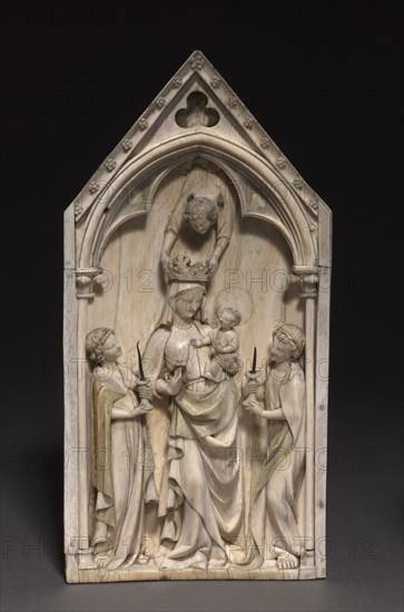 Plaque: The Virgin and Child with Angels, c. 1320-1330. France, Paris, Gothic period. Ivory, traces of paint and gilding; overall: 22.9 x 11.5 cm (9 x 4 1/2 in.).