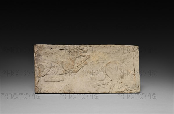 Relief with Rampant Tiger and Boar from a Funerary Stove Model, 206 BC- AD 220. China, from a tomb in Sian-fu, Shensi province, Han dynasty (202 BC-AD 220). Earthenware with relief decoration; overall: 10.2 x 9.6 cm (4 x 3 3/4 in.).