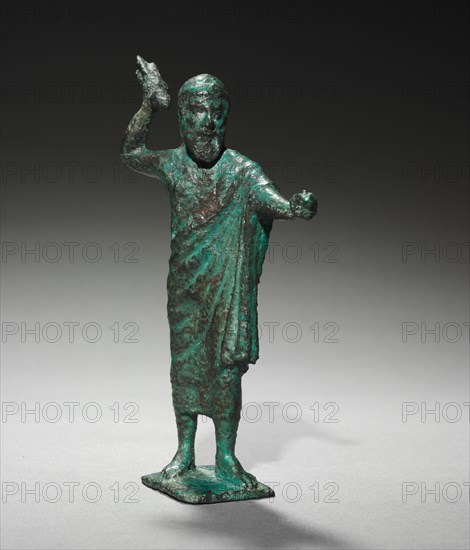 Statuette of Tinia (Zeus), 500-475 BC. Italy, Etruscan, 5th Century BC. Bronze; overall: 13.3 x 8.6 x 3.2 cm (5 1/4 x 3 3/8 x 1 1/4 in.).