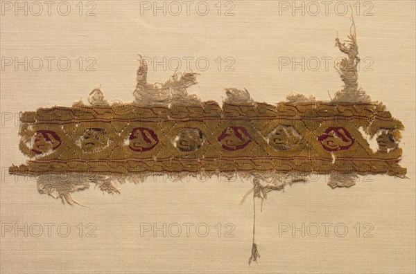 Fragment of a Tiraz-Style Textile, 1130 - 1169. Egypt, Fatimid period, Caliphate of al-Hafiz or later, AH 524-565, 12th Century. Tabby ground with inwoven tapestry ornament; linen and silk; overall: 13.4 x 21 cm (5 1/4 x 8 1/4 in.).