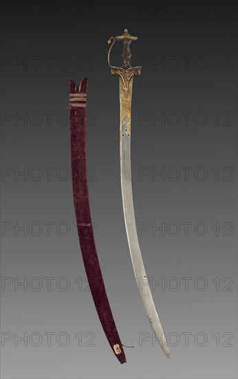 Tulwar sword, 1700s. India, probably Deccan, 18th century. Iron hilt with gold; steel blade with gold; wood scabbard with velvet and metallic thread; overall: 96.6 cm (38 1/16 in.).