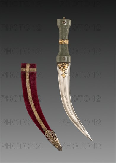 Khanjar dagger, c. 1600s. India, 17th century. Jade hilt with iron and gold; steel blade with iron and gold; wood sheath covered in velvet with metallic thread; overall: 34.4 cm (13 9/16 in.).