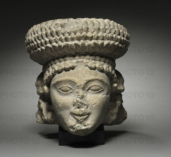 Head, 500-300 BC. Cyprus, 5th - 4th Century BC. Limestone; overall: 26.8 x 24.2 cm (10 9/16 x 9 1/2 in.).