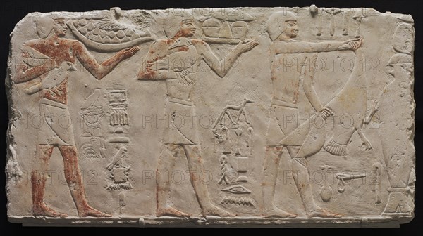 Relief of Three Offering Bearers, c. 2311-2281 BC. Egypt. Saqqara, Old Kingdom, Early Dynasty 6, 2311-2140 BC. Painted limestone; overall: 38.4 x 72.2 cm (15 1/8 x 28 7/16 in.).