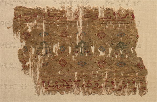 Fragment of a Tiraz, 1130 - 1149. Egypt, Fatimid period, probably during Caliphate of al-Hafiz, AH 524-544 (A.D. 1130-1149). Tapestry (originally inwoven in a tabby ground); linen and silk; overall: 11.5 x 17.2 cm (4 1/2 x 6 3/4 in.).