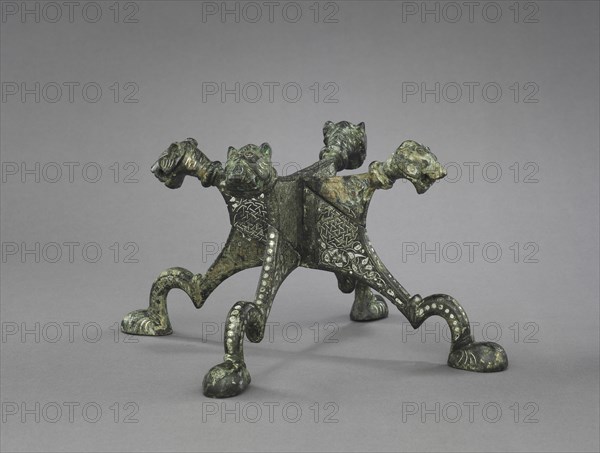 Lion-headed Stand, 1150-1220. Northern Iraq or Syria, Zengid or Ayyubid period. Cast brass inlaid with silver; overall: 14 cm (5 1/2 in.).