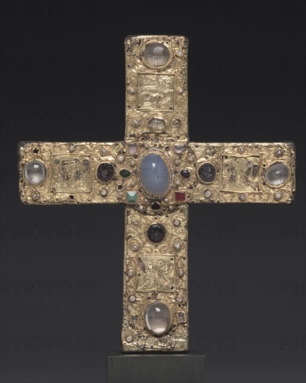 Ceremonial Cross of Count Liudolf, shortly after 1038. Germany, Lower Saxony?, Romanesque period, 11th century. Gold: worked in repoussé; cloisonné enamel; intaglio gems; pearls; wood core; overall: 24.2 x 21.6 cm (9 1/2 x 8 1/2 in.).
