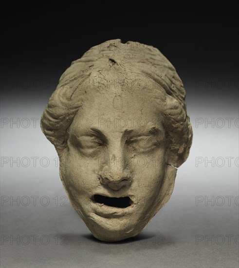Head of a Weeping Woman, 1-200. Parthian, 1st-2nd Century. Terracotta; overall: 11.6 cm (4 9/16 in.).