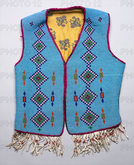 Beaded Vest, c 1900. America, Native North American, Northern Plains, Pikuni (Blackfeet), Post-Contact. Beaded leather; velveteen; ribbon; rayon