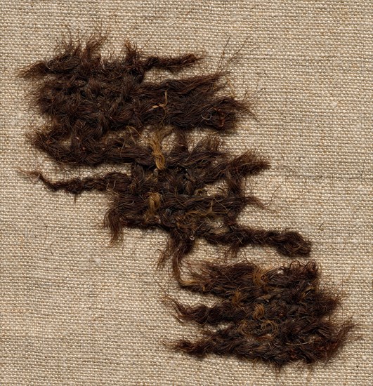 Fragment of Tabby Cloth, 3rd century. Syria, 3rd century. Tabby weave: goat's hair; average: 7 x 4.5 cm (2 3/4 x 1 3/4 in.)