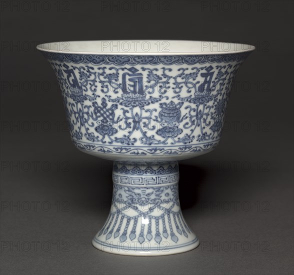 Stem Cup with Tibetan Characters and Buddhist Symbols, 1736-95. China, Qing dynasty (1644-1911), Qianlong mark and reign (1736-95). Porcelain with underglaze blue decoration; diameter: 14.5 cm (5 11/16 in.); overall: 13.4 cm (5 1/4 in.).
